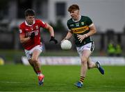 23 May 2025; Kevin Griffin of Kerry in action against Aaron Keane of Cork during the Electric Ireland Munster GAA Football Minor Championship final match between Kerry and Cork at Austin Stack Park in Tralee, Kerry. Photo by Brendan Moran/Sportsfile