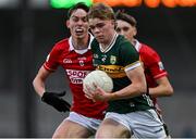 23 May 2025; Maidhc Ó Sé of Kerry in action against Samuel Kelleher Leavy of Cork during the Electric Ireland Munster GAA Football Minor Championship final match between Kerry and Cork at Austin Stack Park in Tralee, Kerry. Photo by Brendan Moran/Sportsfile