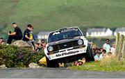 20 June 2025; Gary McPhillips and Paul Sheridan compete in their Ford Escort during day one of the Wilton Recycling Donegal International Rally at Letterkenny in Donegal. Photo by Philip Fitzpatrick/Sportsfile