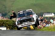 20 June 2025; Gary McPhillips and Paul Sheridan compete in their Ford Escort during day one of the Wilton Recycling Donegal International Rally at Letterkenny in Donegal. Photo by Philip Fitzpatrick/Sportsfile