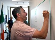 20 June 2025; Irish Olympic silver medallist Kenneth Egan OLY, signs the autograph wall during the Irish Olympians’ Association summer barbecue at Olympic House on the Sport Ireland Campus in Dublin. Photo by Sam Barnes/Sportsfile