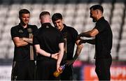 20 June 2025; Bohemians players, including, from left, Adam McDonnell, Dawson Devoy and Jordan Flores before the SSE Airtricity Men's Premier Division match between Waterford and Bohemians at the Regional Sports Centre in Waterford. Photo by Ben McShane/Sportsfile