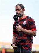 20 June 2025; Derry City manager Tiernan Lynch is interviewed before the SSE Airtricity Men's Premier Division match between Shelbourne and Derry City at Tolka Park in Dublin. Photo by Thomas Flinkow/Sportsfile
