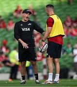 20 June 2025; Argentina head coach Felipe Contepomi, left, in conversation with British & Irish Lions assistant coach Jonathan Sexton before the Lions 1888 Cup match between the British & Irish Lions and Argentina at the Aviva Stadium in Dublin. Photo by Brendan Moran/Sportsfile