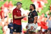 20 June 2025; British & Irish Lions assistant coach Simon Easterby, left, in conversation with Pierre Schoeman of British & Irish Lions before the Lions 1888 Cup match between the British & Irish Lions and Argentina at the Aviva Stadium in Dublin. Photo by Ramsey Cardy/Sportsfile