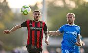 20 June 2025; Adam McDonnell of Bohemians in action against Rowan McDonald of Waterford during the SSE Airtricity Men's Premier Division match between Waterford and Bohemians at the Regional Sports Centre in Waterford. Photo by Ben McShane/Sportsfile
