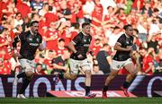 20 June 2025; British & Irish Lions players, from left, Jack Conan, Josh van der Flier and James Lowe warm up before the Lions 1888 Cup match between the British & Irish Lions and Argentina at the Aviva Stadium in Dublin. Photo by Brendan Moran/Sportsfile