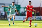 20 June 2025; Gavin Whyte of Derry City in action against JJ Lunney of Shelbourne during the SSE Airtricity Men's Premier Division match between Shelbourne and Derry City at Tolka Park in Dublin. Photo by Thomas Flinkow/Sportsfile