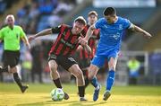 20 June 2025; Rhys Brennan of Bohemians in action against Darragh Leahy of Waterford during the SSE Airtricity Men's Premier Division match between Waterford and Bohemians at the Regional Sports Centre in Waterford. Photo by Ben McShane/Sportsfile