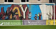 20 June 2025; Galway United supporters celebrate their side's second goal as the ball nets the empty net for a goal by David Hurley of Galway United during the SSE Airtricity Men's Premier Division match between Galway United and St Patrick's Athletic at Eamonn Deacy Park in Galway. Photo by Piaras Ó Mídheach/Sportsfile