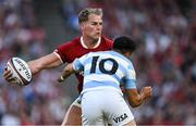 20 June 2025; Duhan van der Merwe of British & Irish Lions is tackled by Tomas Albornoz during the Lions 1888 Cup match between the British & Irish Lions and Argentina at the Aviva Stadium in Dublin. Photo by Brendan Moran/Sportsfile
