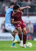 20 June 2025; Moses Dyer of Galway United in action against Joe Redmond of St Patrick's Athletic during the SSE Airtricity Men's Premier Division match between Galway United and St Patrick's Athletic at Eamonn Deacy Park in Galway. Photo by Piaras Ó Mídheach/Sportsfile