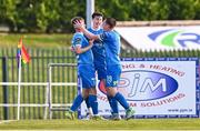 20 June 2025; Conan Noonan, left, celebrates with Waterford teammates Jesse Dempsey, centre, and Sam Glenfield after scoring their side's second goal during the SSE Airtricity Men's Premier Division match between Waterford and Bohemians at the Regional Sports Centre in Waterford. Photo by Ben McShane/Sportsfile