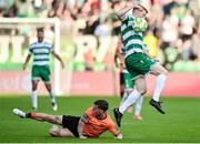 20 June 2025; Rory Gaffney of Shamrock Rovers in action against Evan McLaughlin of Cork City during the SSE Airtricity Men's Premier Division match between Shamrock Rovers and Cork City at Tallaght Stadium in Dublin. Photo by David Fitzgerald/Sportsfile