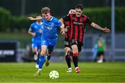20 June 2025; Conan Noonan of Waterford in action against Dawson Devoy of Bohemians during the SSE Airtricity Men's Premier Division match between Waterford and Bohemians at the Regional Sports Centre in Waterford. Photo by Ben McShane/Sportsfile