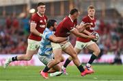 20 June 2025; Ben Earl of British & Irish Lions is tackled by Julian Montoya of Argentina during the Lions 1888 Cup match between the British & Irish Lions and Argentina at the Aviva Stadium in Dublin. Photo by Ramsey Cardy/Sportsfile