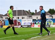 20 June 2025; St Patrick's Athletic manager Stephen Kenny speaking with referee Robert Harvey during the SSE Airtricity Men's Premier Division match between Galway United and St Patrick's Athletic at Eamonn Deacy Park in Galway. Photo by Piaras Ó Mídheach/Sportsfile