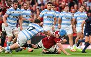 20 June 2025; Tadhg Beirne of British & Irish Lions scores his side's third try despite the efforts of Boris Wenger of Argentina during the Lions 1888 Cup match between the British & Irish Lions and Argentina at the Aviva Stadium in Dublin. Photo by Ramsey Cardy/Sportsfile