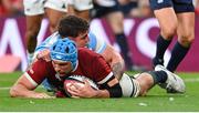 20 June 2025; Tadhg Beirne of British & Irish Lions scores his side's third try despite the efforts of Boris Wenger of Argentina during the Lions 1888 Cup match between the British & Irish Lions and Argentina at the Aviva Stadium in Dublin. Photo by Ramsey Cardy/Sportsfile