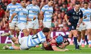 20 June 2025; Tadhg Beirne of British & Irish Lions scores his side's third try despite the efforts of Boris Wenger of Argentina during the Lions 1888 Cup match between the British & Irish Lions and Argentina at the Aviva Stadium in Dublin. Photo by Ramsey Cardy/Sportsfile