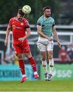 20 June 2025; Sam Bone of Shelbourne in action against Michael Duffy of Derry City during the SSE Airtricity Men's Premier Division match between Shelbourne and Derry City at Tolka Park in Dublin. Photo by Thomas Flinkow/Sportsfile