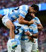 20 June 2025; Santiago Cordero of Argentina, 23, celebrates with team-mates after scoring their side's third try during the Lions 1888 Cup match between the British & Irish Lions and Argentina at the Aviva Stadium in Dublin. Photo by Brendan Moran/Sportsfile