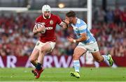 20 June 2025; Mack Hansen of British & Irish Lions is tackled by Santiago Cordero of Argentina during the Lions 1888 Cup match between the British & Irish Lions and Argentina at the Aviva Stadium in Dublin. Photo by Ramsey Cardy/Sportsfile