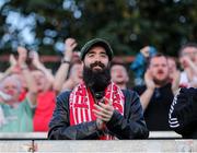 20 June 2025; A Derry City supporter after his side's victory in the SSE Airtricity Men's Premier Division match between Shelbourne and Derry City at Tolka Park in Dublin. Photo by Thomas Flinkow/Sportsfile
