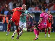 20 June 2025; Mipo Odubeko of Shelbourne in action against Mark Connolly of Derry City and goalkeeper Brian Maher during the SSE Airtricity Men's Premier Division match between Shelbourne and Derry City at Tolka Park in Dublin. Photo by Thomas Flinkow/Sportsfile