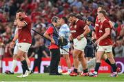 20 June 2025; British & Irish Lions players, including Rónan Kelleher, left, after their side's defeat in the Lions 1888 Cup match between the British & Irish Lions and Argentina at the Aviva Stadium in Dublin. Photo by Ramsey Cardy/Sportsfile