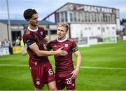 20 June 2025; Galway United players Patrick Hickey, left, and Conor McCormack celebrate after their side's victory in the SSE Airtricity Men's Premier Division match between Galway United and St Patrick's Athletic at Eamonn Deacy Park in Galway. Photo by Piaras Ó Mídheach/Sportsfile