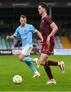 20 June 2025; Patrick Hickey of Galway United in action against Jamie Lennon of St Patrick's Athletic during the SSE Airtricity Men's Premier Division match between Galway United and St Patrick's Athletic at Eamonn Deacy Park in Galway. Photo by Piaras Ó Mídheach/Sportsfile