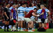 20 June 2025; Tommy Freeman of British & Irish Lions receives medical attention from team doctor Ciaran Cosgrove during the Lions 1888 Cup match between the British & Irish Lions and Argentina at the Aviva Stadium in Dublin. Photo by Brendan Moran/Sportsfile