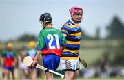 21 June 2025; Joseph Spain of Michael Cusasks shakes hands with Adam Fox of Shamrocks after the John West Féile na nGael Camogie and Hurling National Finals match between Michael Cusacks and Shamrocks at Hailo Tiles Wexford GAA Centre of Excellence in Ferns, Wexford. Photo by Shauna Clinton/Sportsfile