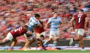 20 June 2025; Joaquin Oviedo of Argentina is tackled by Finlay Bealham of British & Irish Lions during the Lions 1888 Cup match between the British & Irish Lions and Argentina at the Aviva Stadium in Dublin. Photo by Ramsey Cardy/Sportsfile