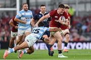 20 June 2025; Tommy Freeman of British & Irish Lions is tackled by Santiago Carreras of Argentina during the Lions 1888 Cup match between the British & Irish Lions and Argentina at the Aviva Stadium in Dublin. Photo by Ramsey Cardy/Sportsfile