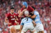 20 June 2025; Tadhg Beirne of British & Irish Lions is tackled by Juan Martín Gonzalez and Simón Benitez Cruz of Argentina during the Lions 1888 Cup match between the British & Irish Lions and Argentina at the Aviva Stadium in Dublin. Photo by Ramsey Cardy/Sportsfile
