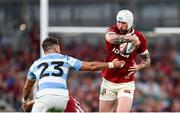 20 June 2025; Mack Hansen of British & Irish Lions is tackled by Santiago Cordero of Argentina during the Lions 1888 Cup match between the British & Irish Lions and Argentina at the Aviva Stadium in Dublin. Photo by Ramsey Cardy/Sportsfile