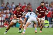 20 June 2025; Sione Tuipulotu of British & Irish Lions in action against Tomas Albornoz of Argentina during the Lions 1888 Cup match between the British & Irish Lions and Argentina at the Aviva Stadium in Dublin. Photo by Ramsey Cardy/Sportsfile