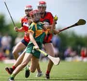 21 June 2025; Ellen O'Leary of Blackwater St Brigid's in action against Ali McCarthy of Blarney during the John West Féile na nGael Camogie and Hurling National Finals match between Blarney and Blackwater St Brigid's at Hailo Tiles Wexford GAA Centre of Excellence in Ferns, Wexford. Photo by Shauna Clinton/Sportsfile