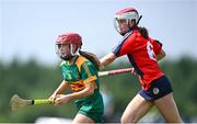 21 June 2025; Ellen O'Leary of Blackwater St Brigid's in action against Ali McCarthy of Blarney during the John West Féile na nGael Camogie and Hurling National Finals match between Blarney and Blackwater St Brigid's at Hailo Tiles Wexford GAA Centre of Excellence in Ferns, Wexford. Photo by Shauna Clinton/Sportsfile
