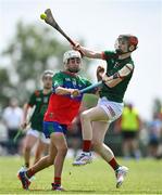 21 June 2025; Cathal Bonnar of Cashel King Cormacs in action against Rory Grennan of Shamrocks during the John West Féile na nGael Camogie and Hurling National Finals match between Cashel King Cormacs and Shamrocks at Hailo Tiles Wexford GAA Centre of Excellence in Ferns, Wexford. Photo by Shauna Clinton/Sportsfile