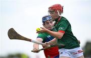 21 June 2025; Scott Ryan of Cashel King Cormacs in action against Ben Boland of Shamrocks during the John West Féile na nGael Camogie and Hurling National Finals match between Cashel King Cormacs and Shamrocks at Hailo Tiles Wexford GAA Centre of Excellence in Ferns, Wexford. Photo by Shauna Clinton/Sportsfile