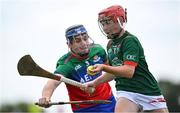 21 June 2025; Scott Ryan of Cashel King Cormacs in action against Ben Boland of Shamrocks during the John West Féile na nGael Camogie and Hurling National Finals match between Cashel King Cormacs and Shamrocks at Hailo Tiles Wexford GAA Centre of Excellence in Ferns, Wexford. Photo by Shauna Clinton/Sportsfile