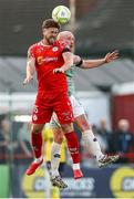 20 June 2025; Sam Bone of Shelbourne in action against Liam Boyce of Derry City during the SSE Airtricity Men's Premier Division match between Shelbourne and Derry City at Tolka Park in Dublin. Photo by Thomas Flinkow/Sportsfile