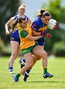 21 June 2025; Laura Morrissey of Tipperary in action against Blaithnaid McLaughlin of Donegal during the TG4 All-Ireland Ladies Football Senior Championship Group 1 match between Tipperary and Donegal at Canon Hayes Park in Bansha, Tipperary. Photo by Seb Daly/Sportsfile