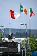 21 June 2025; The Cork flag, the Irish Tricolour, and the Mayo flag flying before the TG4 All-Ireland Ladies Football Senior Championship Group 2 match between Mayo and Cork at Hastings Insurance MacHale Park in Castlebar, Mayo. Photo by Piaras Ó Mídheach/Sportsfile