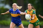 21 June 2025; Feena McManamon of Donegal in action against Emma Morrissey of Tipperary during the TG4 All-Ireland Ladies Football Senior Championship Group 1 match between Tipperary and Donegal at Canon Hayes Park in Bansha, Tipperary. Photo by Seb Daly/Sportsfile
