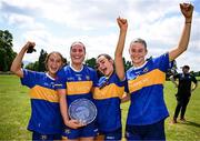 21 June 2025; Tipperary players, from left, Clara English, Player of the Match Laura Morrissey, Sarah English and Neassa Towey celebrate after their side's victory in the TG4 All-Ireland Ladies Football Senior Championship Group 1 match between Tipperary and Donegal at Canon Hayes Park in Bansha, Tipperary. Photo by Seb Daly/Sportsfile