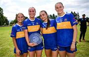 21 June 2025; Tipperary players, from left, Clara English, Player of the Match Laura Morrissey, Sarah English and Neassa Towey after their side's victory in the TG4 All-Ireland Ladies Football Senior Championship Group 1 match between Tipperary and Donegal at Canon Hayes Park in Bansha, Tipperary. Photo by Seb Daly/Sportsfile